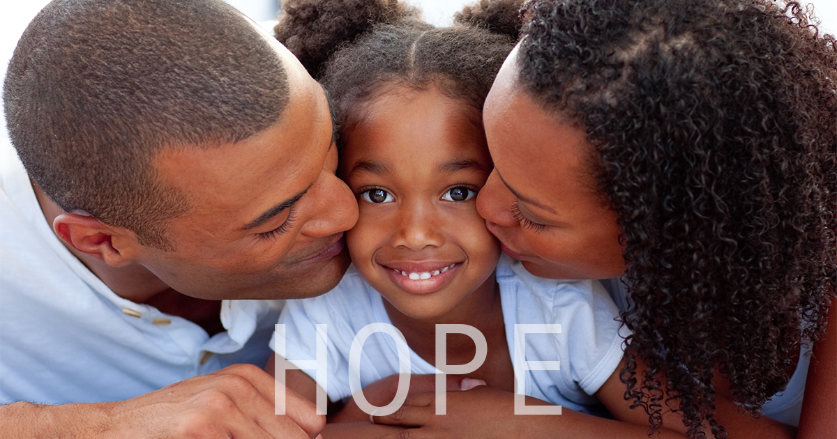 Parents with one child and the word "hope."